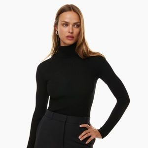 Wilfred Huet turtleneck.